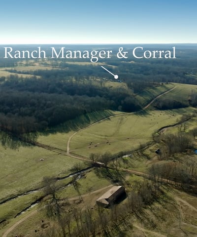 View looking west over the ranch manager home across the central pasture toward Bentonville corridor