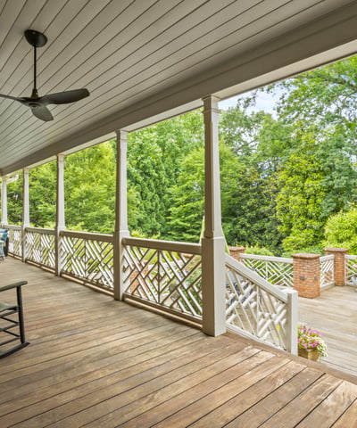 Beautiful covered porches and decks on the entire back of home made of Brazilian IPE Ironwood that beautifully silvers over time