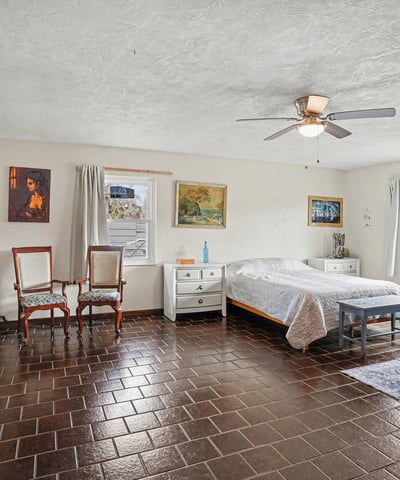 The Master Bedroom with an ensuite bathroom, newly remodeled and very large! Previous owners had a California King sleigh bed. Make it a private oasis- make it your own!