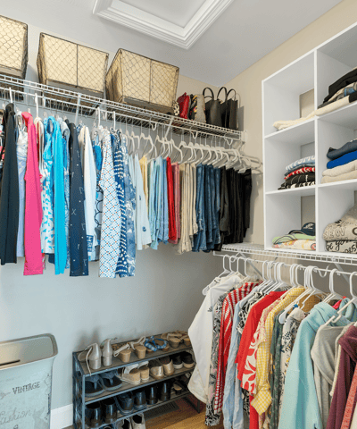 Spacious and organized closet featuring ample shelving and hanging options for efficient storage and easy access.
