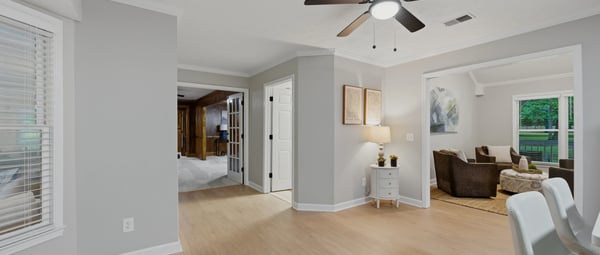 Bright and inviting living space featuring modern lighting and an open layout ideal for entertaining.
