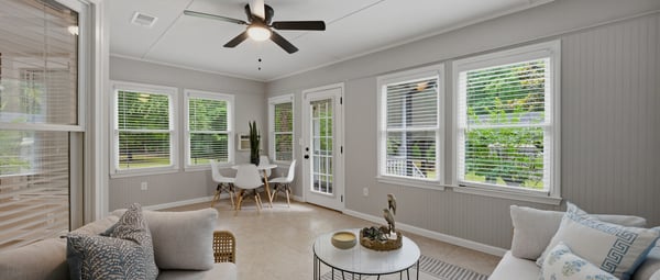 Sunroom with ample natural light, perfect for relaxation or entertaining guests.