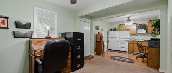 Cottage features a covered front porch, an open living area, kitchenette, private bedroom, and full bath. A versatile space that offers flexibility and functionality, perfect for hosting guests, working from home, or creating a studio or hobby space.