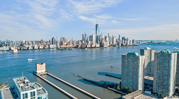 Stunning waterfront property with breathtaking skyline views, offering unparalleled urban living and natural beauty.
