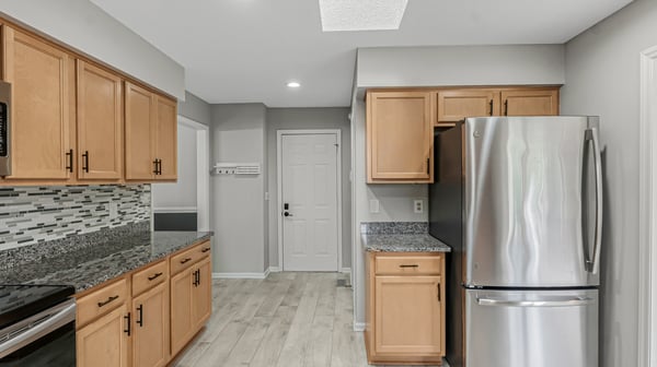 Modern kitchen featuring sleek cabinetry, updated appliances, and a practical layout for effortless meal preparation.