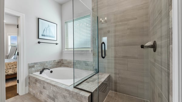 Soaking Tub and Glassed in Shower with Built-in Bench