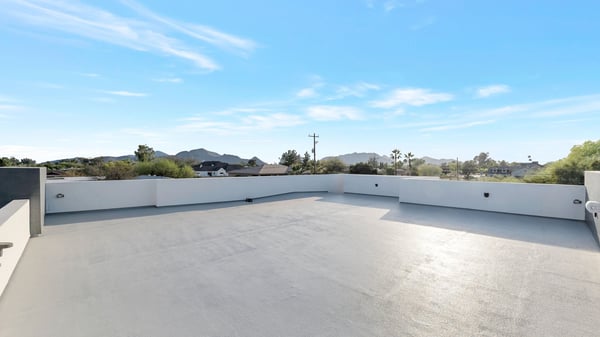 Expansive rooftop deck with scenic views and open space for entertaining. This Paradise Valley home delivers elevated outdoor living and privacy.