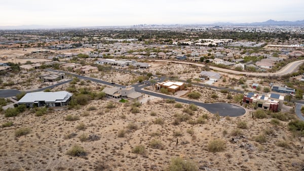 Spectacular city light and mountain views create an unforgettable backdrop for this elevated luxury homesite. Enjoy dramatic desert sunsets and panoramic Phoenix scenery from this premier hillside setting.