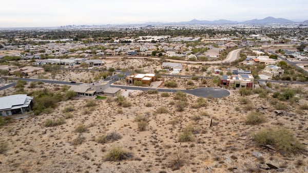 Expansive mountain and desert views surround this elevated homesite in one of Phoenix s most desirable hillside communities. A perfect canvas for a luxury custom home with preserve access nearby.