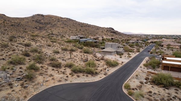 Elevated homesite featuring dramatic mountain backdrops and scenic desert surroundings. Enjoy peaceful hillside living with direct access to nearby hiking trails and outdoor recreation in Phoenix.