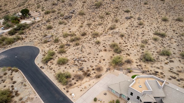 Stunning hillside lot located within the natural desert landscape of Phoenix. Surrounded by mountain scenery and luxury custom homes, this elevated property offers privacy and exceptional build possibilities.