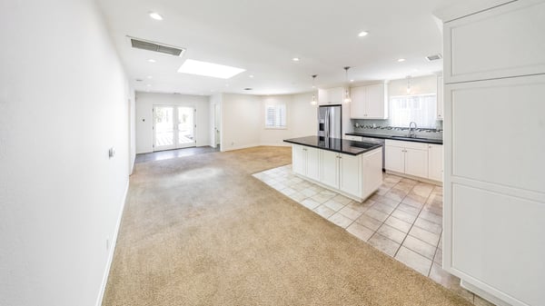 View towards kitchen, family area, primary suite and backyard