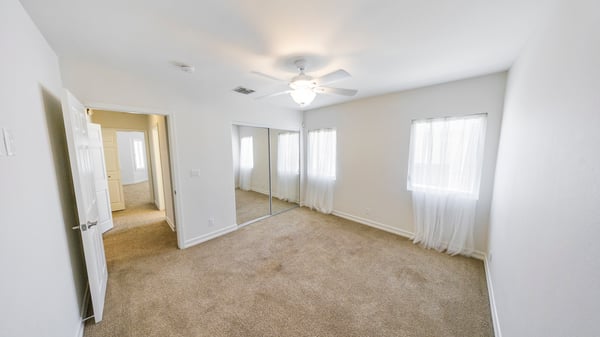 View towards front bedroom, laundry closet and bathroom