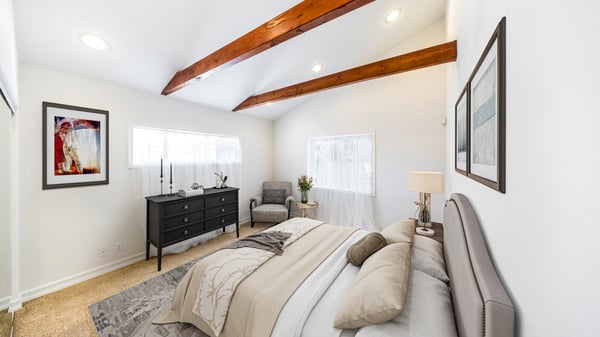 Virtually staged primary bedroom suite