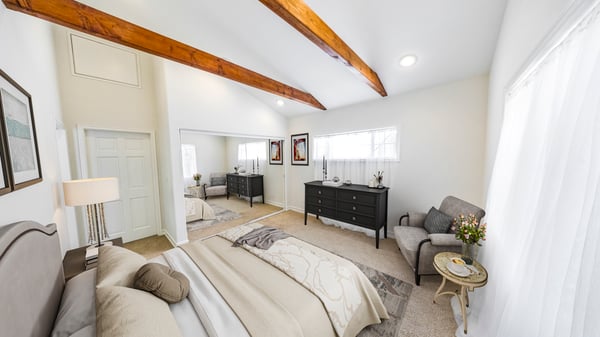 Virtually staged primary bedroom suite