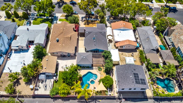 Aerial view of property and neighborhood