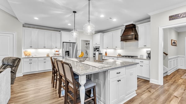 Modern kitchen featuring ample counter space, a spacious island, and high-end appliances, perfect for entertaining.
