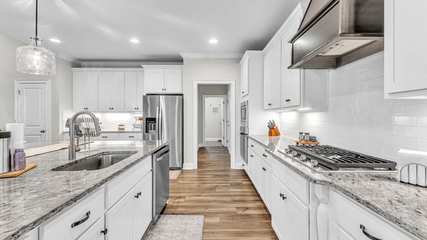 Modern kitchen featuring sleek appliances, ample counter space, and a welcoming layout perfect for entertaining.