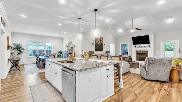 Bright and spacious open-concept living area features modern amenities and natural light throughout.