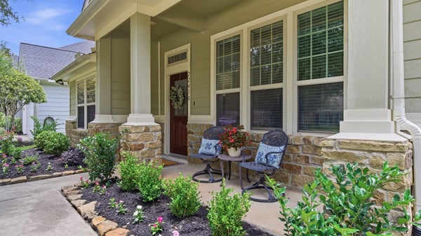 Lovely front porch to enjoy your morning coffee and wave to neighbors.