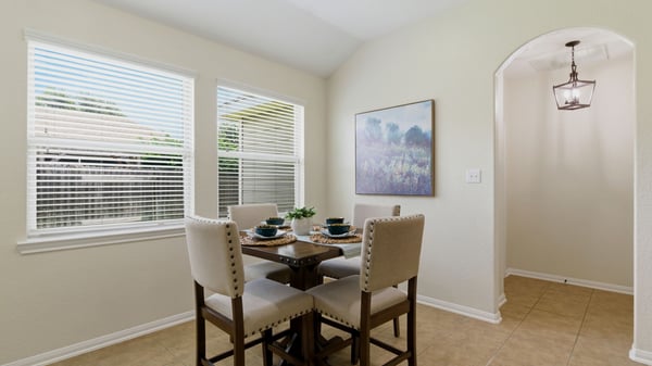 Casual dining area open to all the action in the kitchen and living room.