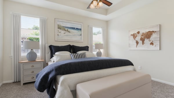 Fantastic primary bedroom with tray ceilings. Virtually staged.