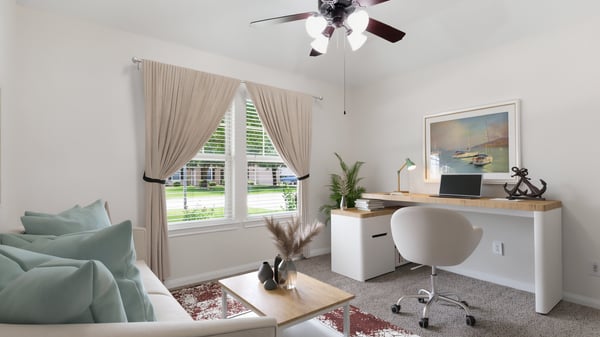 Secondary bedroom on the front of the house. Virtually staged as an office.