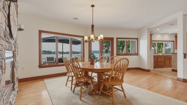 Dining area right off the kitchen with access to large deck overlooking the lake