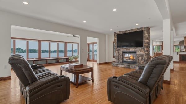 Large open family gathering space with pass-through fireplace
