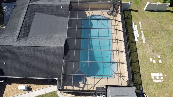 Spacious property featuring a screened pool area, perfect for enjoying outdoor gatherings and relaxation.