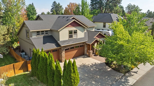 This spacious home features a welcoming entry, landscaped yard, and ample parking in a vibrant neighborhood.