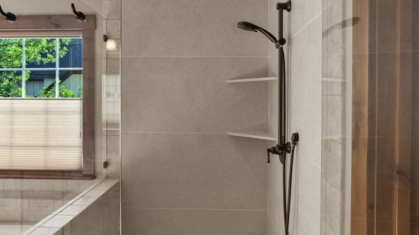 Modern bathroom featuring a spacious walk-in shower with contemporary fixtures and natural light.