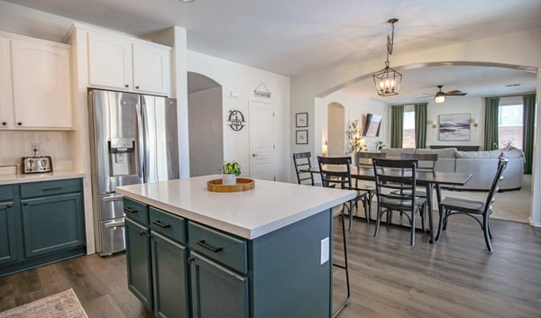Welcoming front entry featuring upgraded stair flooring, modern finishes, and an open layout that showcases the home's spacious design and thoughtful renovations.