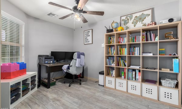 Bright and versatile, this bonus room offers endless possibilities as a home office, study area, craft room, or playroom. Updated flooring, ceiling fan, and natural light create a comfortable workspace.