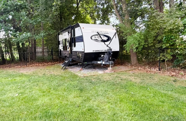 One of two gravel pads for storing equipment, a boat, or a camper.