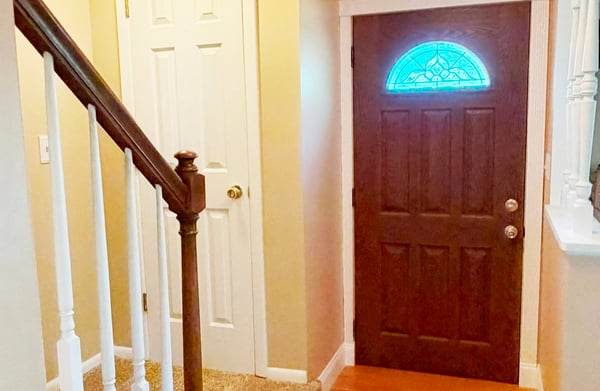 Owner Unit Front Entrance w/ new HW floor 2021 & stairway carpet 2024