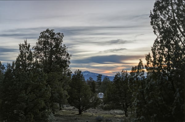 Three Sisters Mountain Views to the Southwest. Experience breathtaking sunsets and expansive views, surrounded by towering trees in this tranquil, nature-inspired retreat.