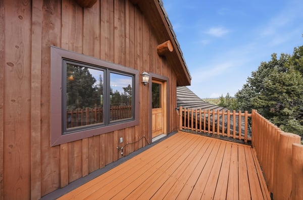 Enjoy fresh air and stunning views from this spacious deck, perfect for relaxation.