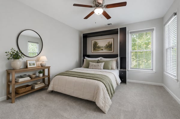 Bright and inviting bedroom featuring ample natural light, modern decor, and a versatile built-in murphy. (Virtual Staging)