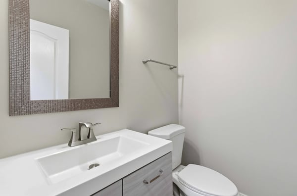 Updated modern half bath on main level