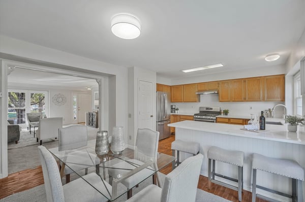 View of living room, dining and kitchen