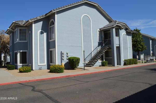 Well-maintained community exterior featuring mature landscaping, attractive architecture, and welcoming surroundings. Buyers will appreciate the clean appearance and convenient Phoenix location.