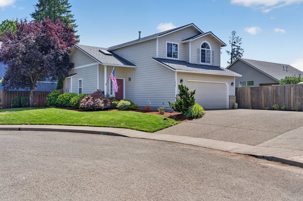 This well-maintained home features a spacious yard, inviting curb appeal, and a peaceful cul-de-sac location.
