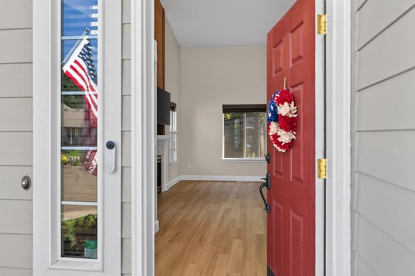 Step into this inviting entryway, showcasing an open layout and abundant natural light throughout.