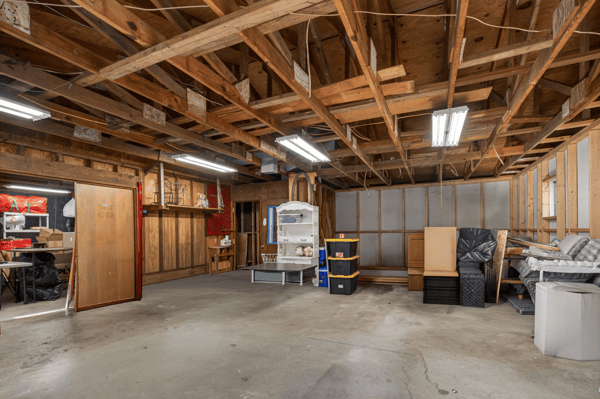 Spacious workshop with open layout, ready for customization and ideal for storage or workshop projects.