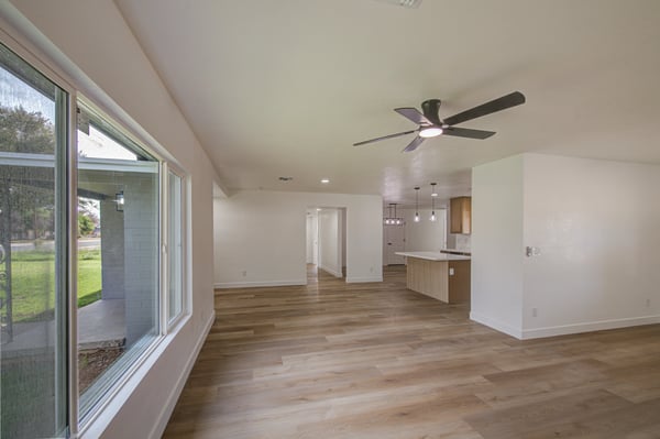 The open floor plan connects the living room and kitchen, offering an ideal layout for entertaining while showcasing modern updates throughout the home.