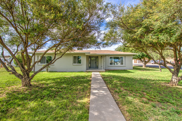 Mature trees, fresh landscaping, and updated exterior finishes welcome you to this beautifully remodeled Buckeye home with exceptional curb appeal and move-in-ready condition.