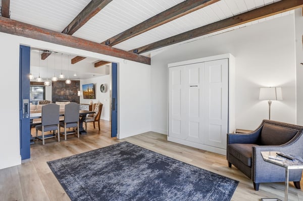Functional flex room includes a built-in Murphy bed and easily serves as a guest bedroom, office, or media room. Updated finishes make this space adaptable to your lifestyle.