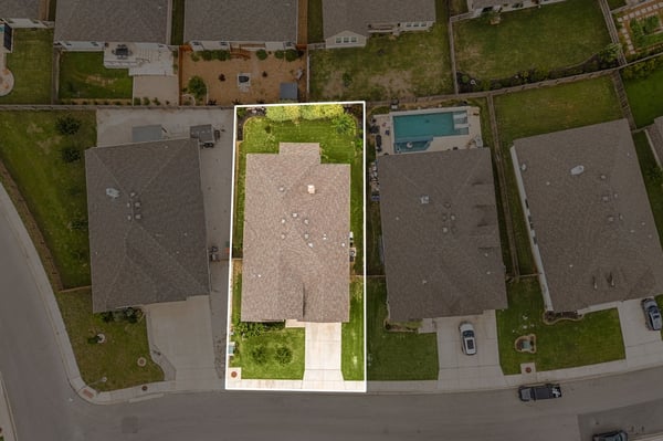 Spacious lot with well-maintained home, conveniently located near parks and local amenities for easy living.