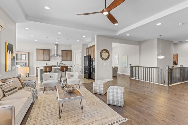 Spacious open-concept living area with modern finishes and abundant natural light, perfect for entertaining.
